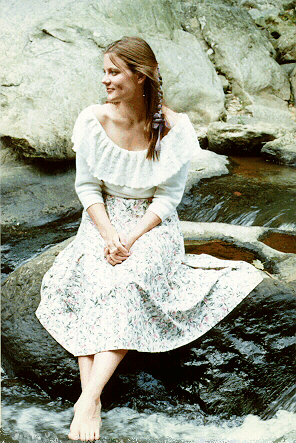 [You are missing a lovely picture of Kathleen, barefoot, seated on a rock in the middle of the Muddy Branch River.  It is spring, the sun is shining and it is wonderfully warm.  Her toes just brush the water.]